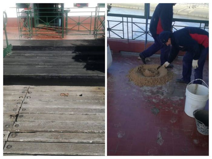 Trabajos de albañilería en la escalera de acceso al muelle